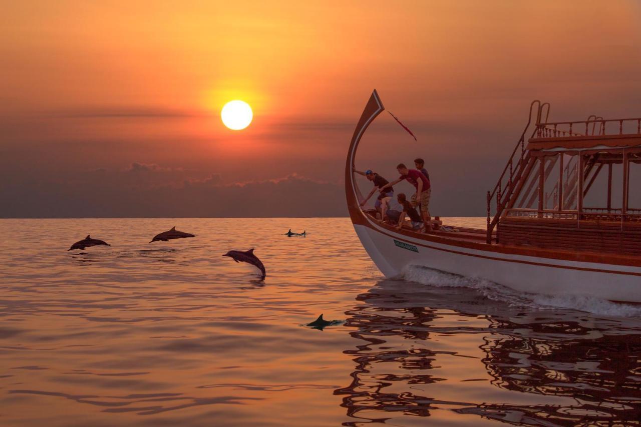 Radisson Blu Resort Maldives With 50 Percent Off On Sea Plane Round Trip 03 Nights & Above Fenfushi Exterior foto Sunset over the Gulf of Akaroa