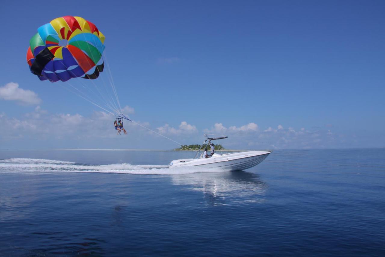 Radisson Blu Resort Maldives With 50 Percent Off On Sea Plane Round Trip 03 Nights & Above Fenfushi Exterior foto Parasailing in Mauritius