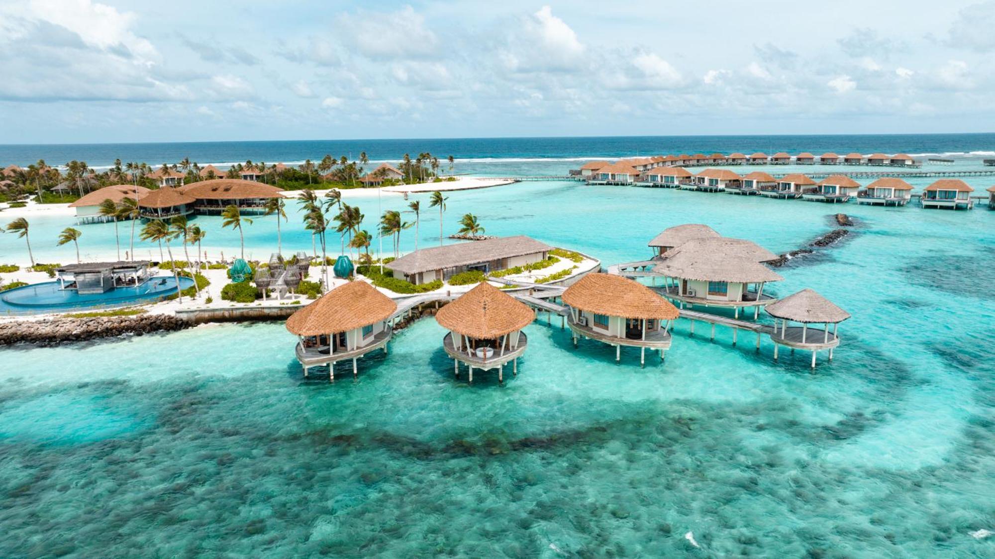 Radisson Blu Resort Maldives With 50 Percent Off On Sea Plane Round Trip 03 Nights & Above Fenfushi Exterior foto The resort's villas